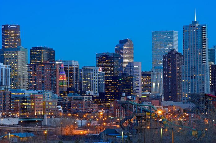Denver skyline at sunset (Photo by Flickr user Larry Johnson)