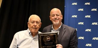 George Solomon earns standing ovation, Jack Berninger Award at APSE George Solomon receives the Jack Berninger Award from APSE President Paul Barrett during the APSE Summer Conference in Arlington, Virginia, on Friday, July 17, 2026. (Photo by Maria McIlwain)