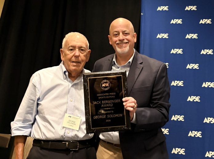 IMG_7889-jpg George Solomon receives the Jack Berninger Award from APSE President Paul Barrett during the APSE Summer Conference in Arlington, Virginia, on Friday, July 17, 2026. (Photo by Maria McIlwain)