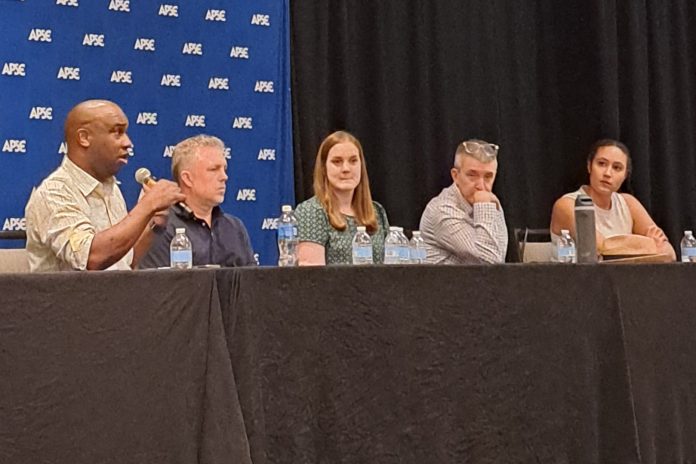 Jason Murray, Joe Tone, Emily Giambalvo, Matt Rennie and Ava Wallace discuss The Washington Post layoffs during the Associated Press Sports Editors Summer Conference in Arlington, Virginia, on Thursday, July 16, 2026. (Photo by Trevor Gomes)